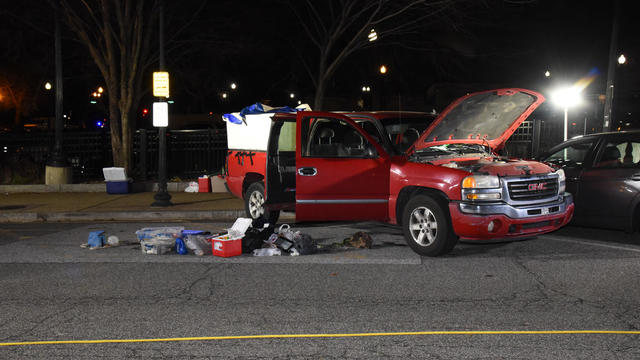 Pickup truck allegedly packed with gasoline-filled jars.jpg 