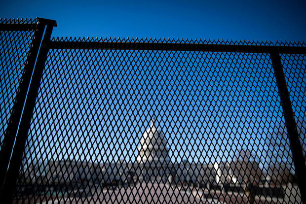 Protective Fencing Erected Around Buildings In Wake Of Capitol Hill Rioting 