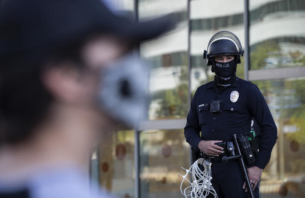 Black Lives Matter protest in front of LAPD during the coronavirus pandemic in Los Angeles 