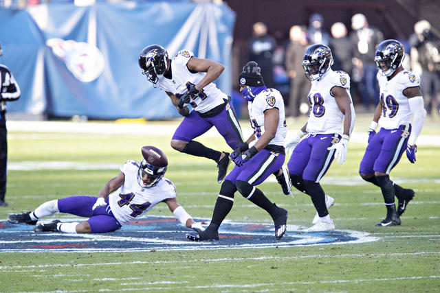 Ravens players explain why they stomped on Titans' logo