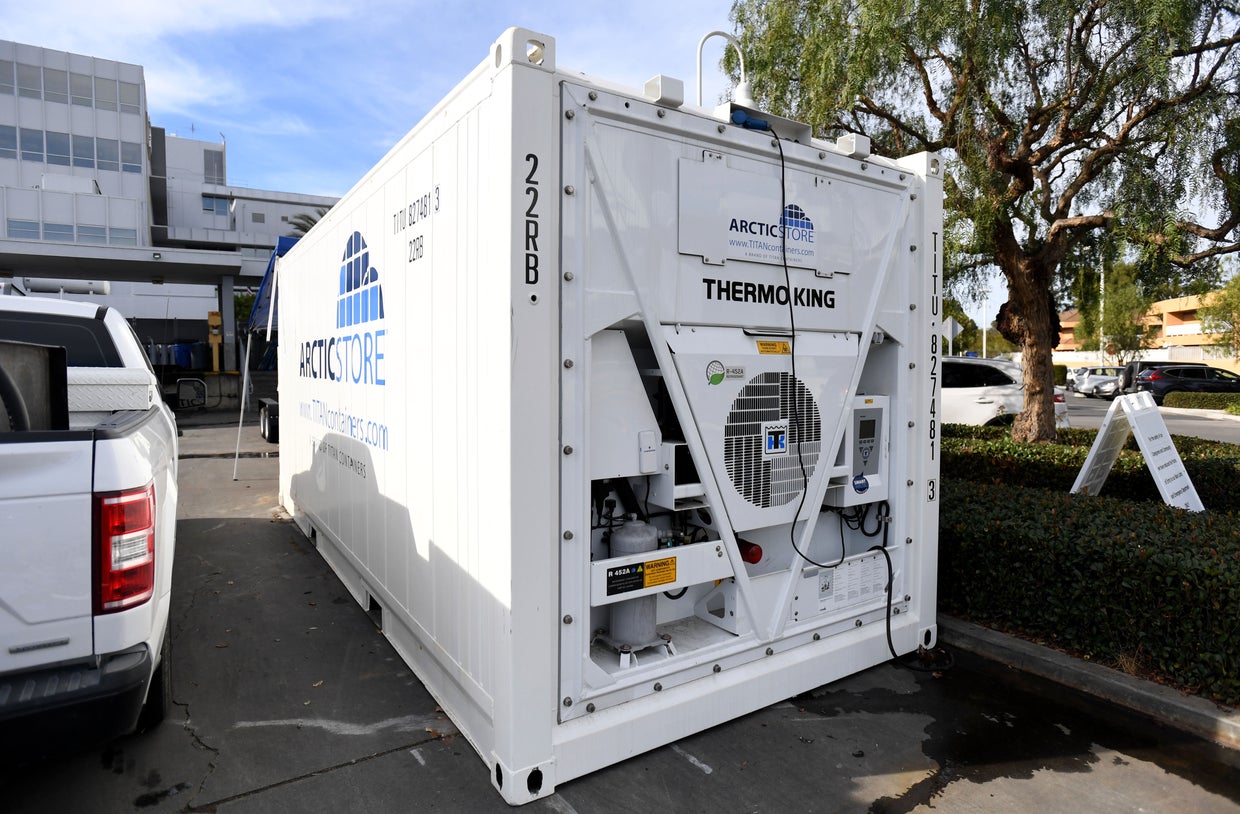 Some hospitals are using portable morgues due to the surge in COVID-19 deaths. 