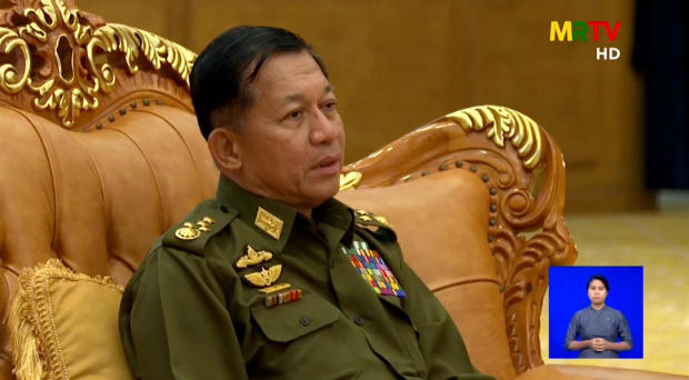 Myanmar Senior General Min Aung Hlaing is seen speaking during a meeting in a screengrab from a state television broadcast from February 3, 2021. 