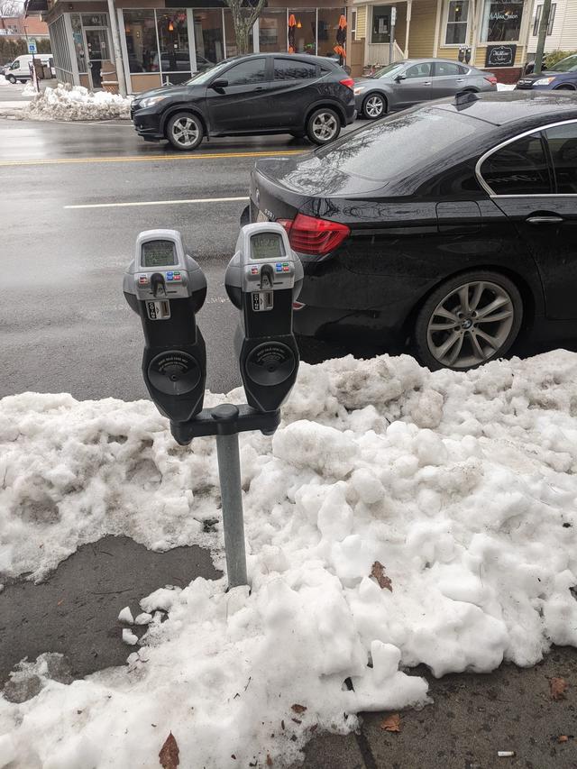 Too Tall Parking Meters In Watertown Being Brought Down To Size