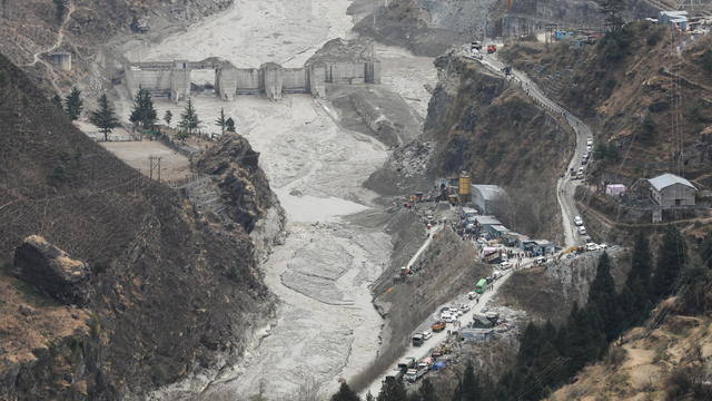 Rescue operation outside a tunnel after a part of a glacier broke away, in Tapovan 