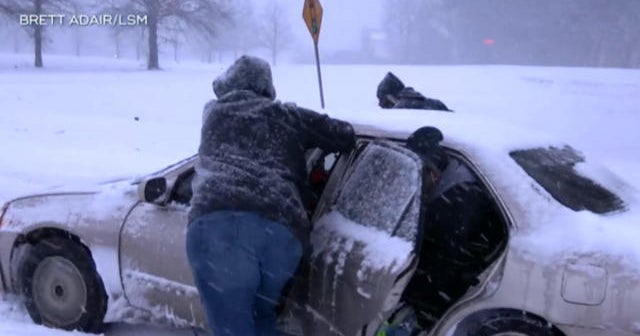 Dangerous winter storm lashes East Coast with snow and ice - CBS News
