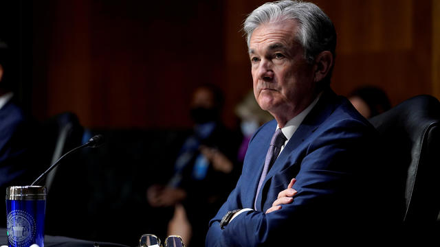 FILE PHOTO: Chairman of the Federal Reserve Jerome Powell listens during a Senate Banking Committee hearing in Washington 