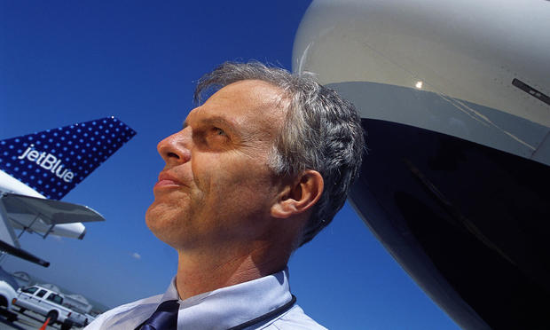 JetBlue CEO David Neeleman near Airplanes 