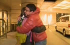 CBS News' Lucy Craft embraces her son Kohei as they're reunited four days after the March 11, 2011, earthquake and tsunami that devastated the northeast Japan region where Kohei was in high school. 