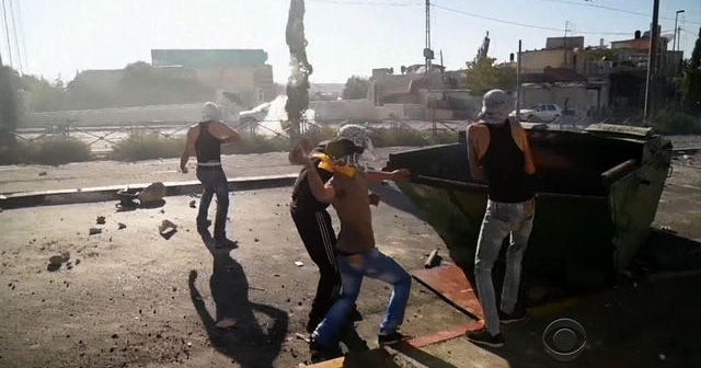 Palestinian teen burned alive, autopsy finds - CBS News