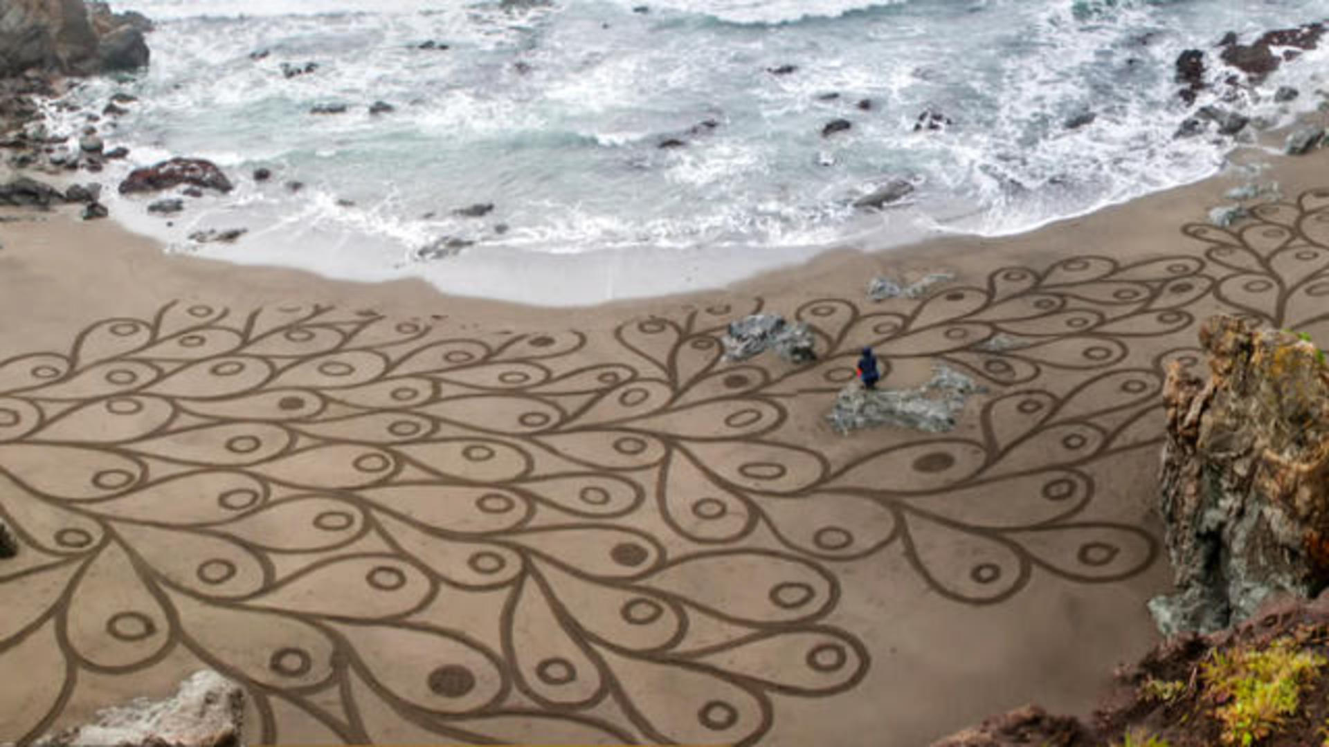 California sand artist brings moments of Zen to storm-battered coast