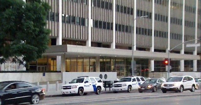 Why is the government increasing security at federal buildings? CBS News