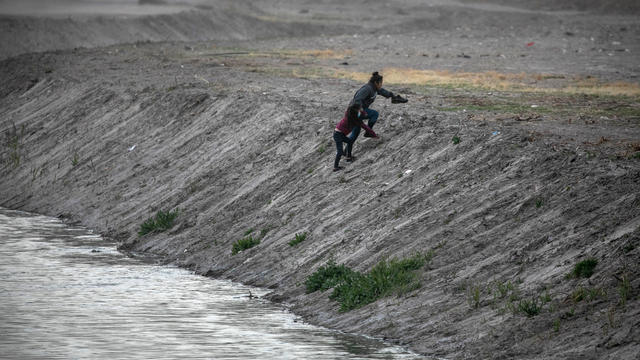 Migrants Cross From Mexico Into U.S. Near Ciudad Juarez 