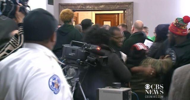 Fight erupts at St. Louis City Hall - CBS News