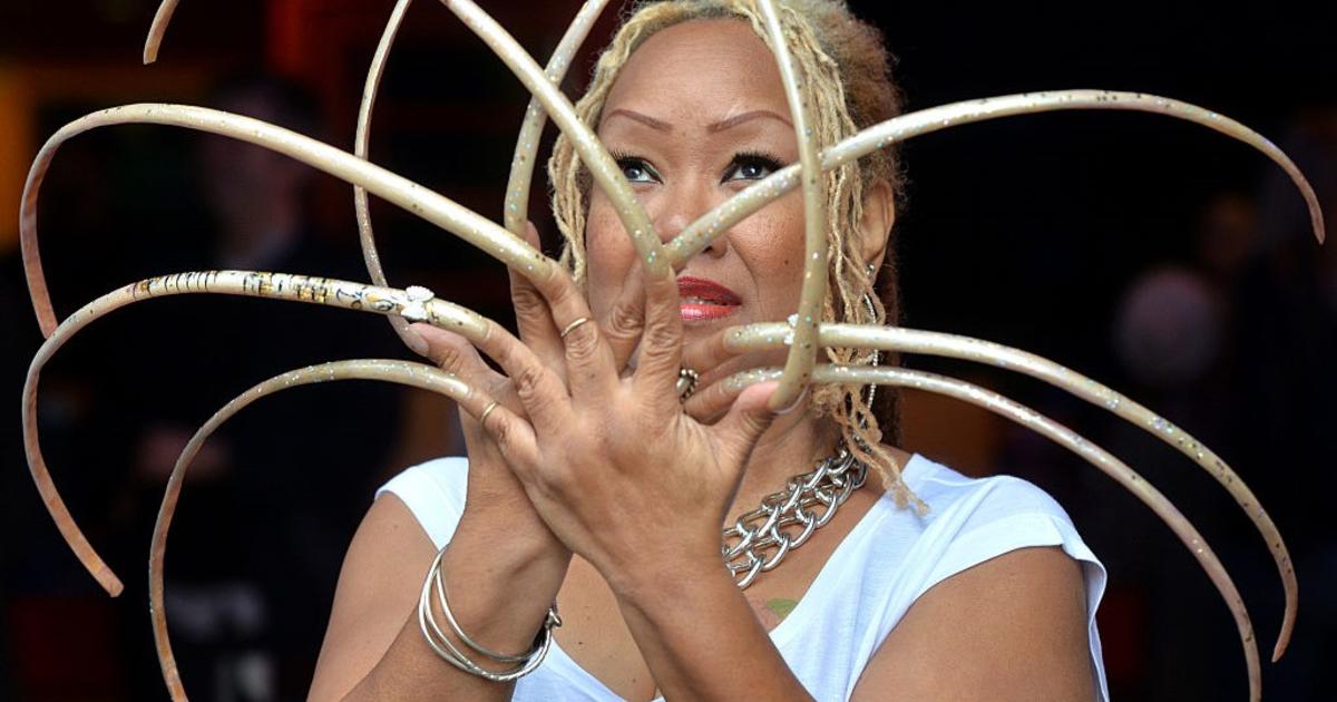 Woman grows world's longest fingernails after family tragedy | Stuff