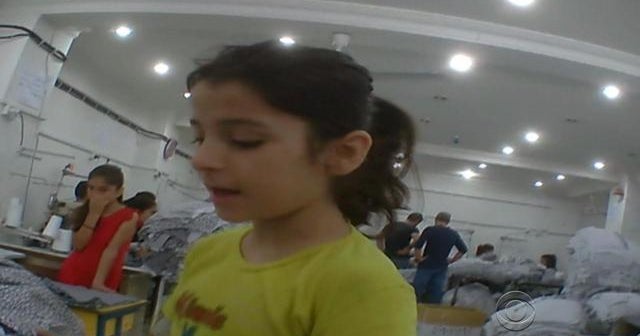 Syrian migrant children conscripted into sweat shops - CBS News