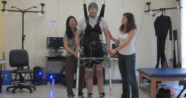 Brain power helps paralyzed man walk again CBS News