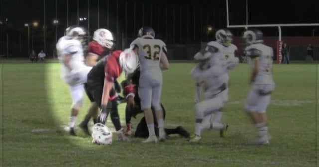 California high school football rivalry turns violent - CBS News