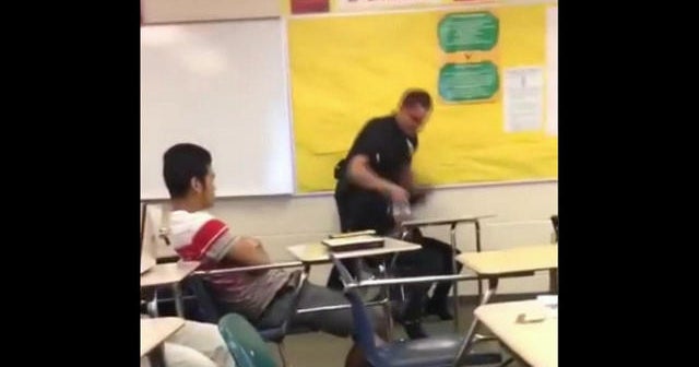 Sheriff who slammed student to ground placed on leave - CBS News