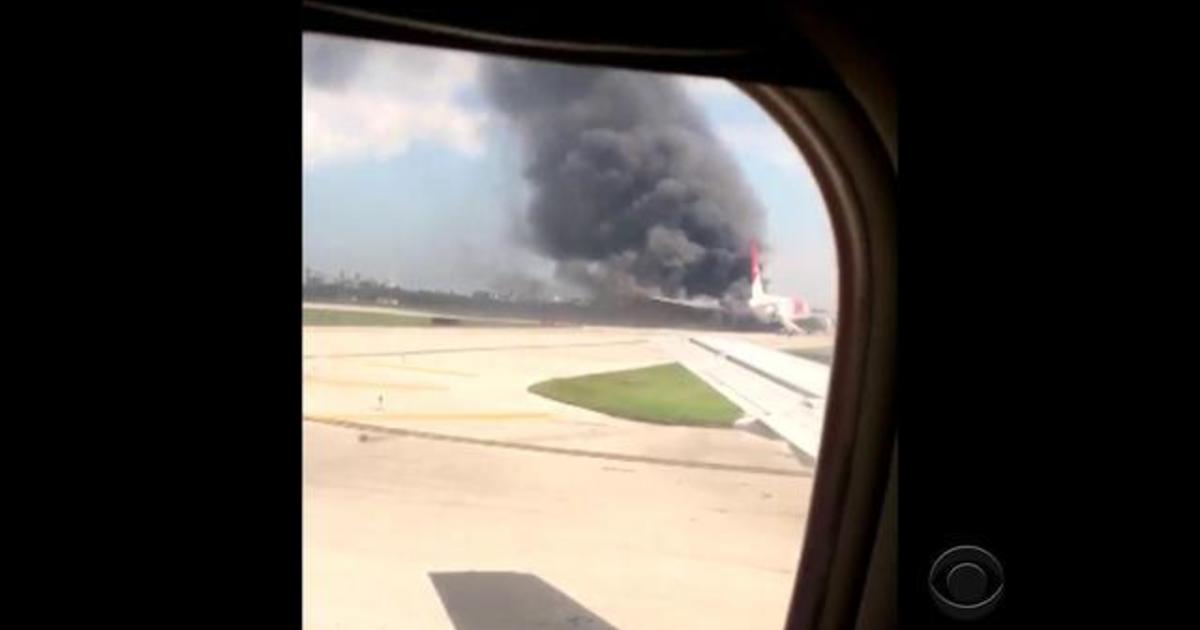 Airplane Catches Fire On Fla Runway Cbs News