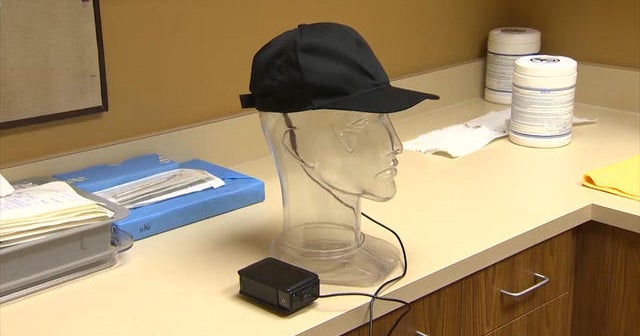 Could laserlight baseball cap help regrow hair? CBS News