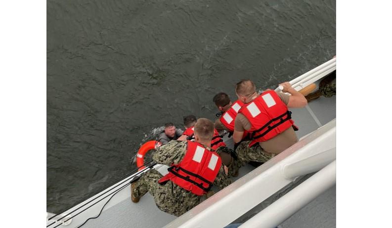 1 dead, 12 crewmembers missing after boat capsizes in rough seas off ...
