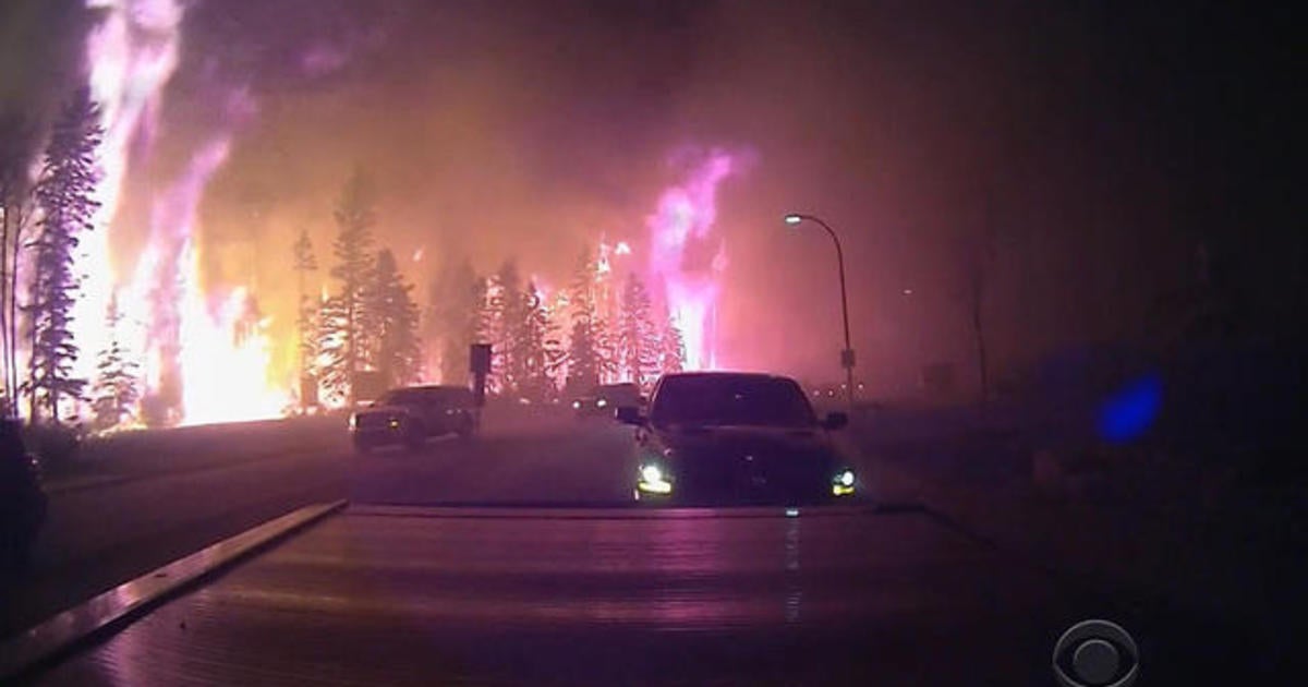 Wildfire Drives Massive Evacuation In Alberta Canada Cbs News