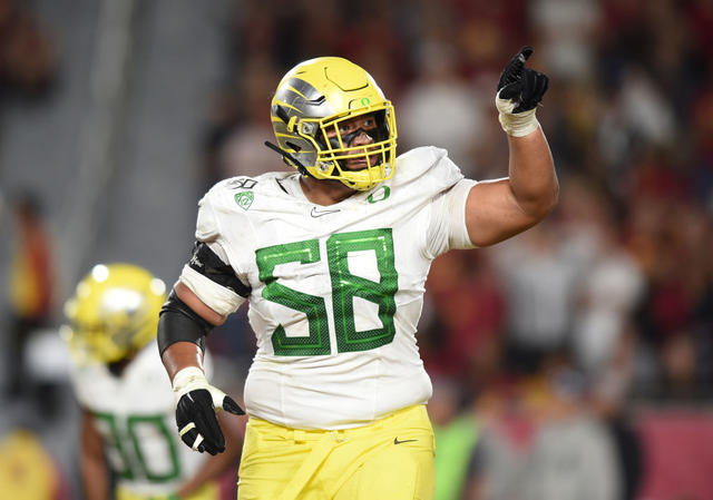 Penei Sewell of the Oregon Ducks looks on against the Washington