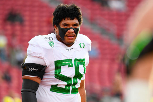 FILE PHOTOS).former Oregon Ducks offensive tackle (58) Penei