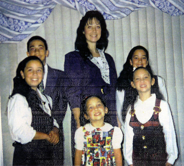 Mother Sandi Nieves in a family photo with her son and four daughters. She took the witness stand in 