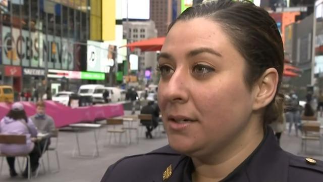 cbsn-fusion-an-nypd-officer-being-called-a-hero-after-video-of-her-carrying-the-4-year-old-girl-who-was-shot-in-times-square-to-safety-thumbnail-712001-640x360.jpg 
