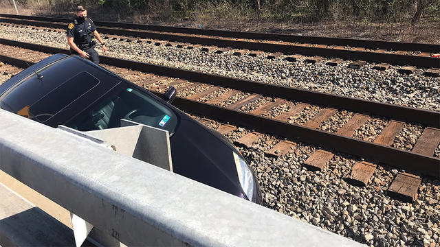 car-stuck-on-tracks.jpg 