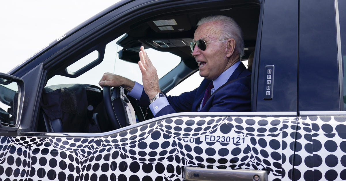 Biden drives electric vehicle and touts it as the "future of the auto industry" - CBS News