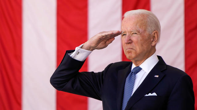 President Biden salutes during a Memorial Day observance at Arlington National Cemetery in Arlington, Virginia, May 31, 2021. 