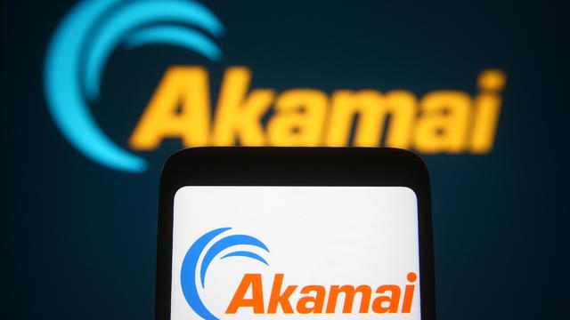 In this photo illustration, Akamai logo of an internet 