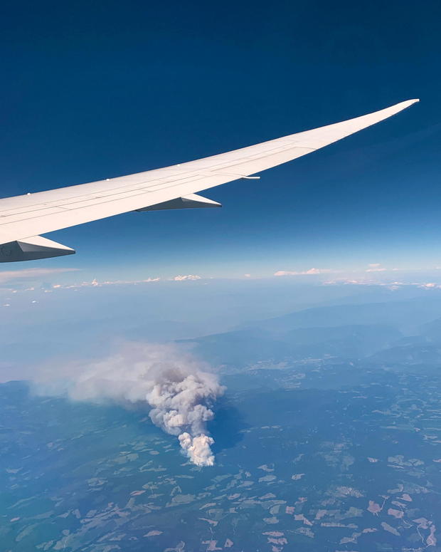 View shows a wildfire seen from an airplane, Lytton 