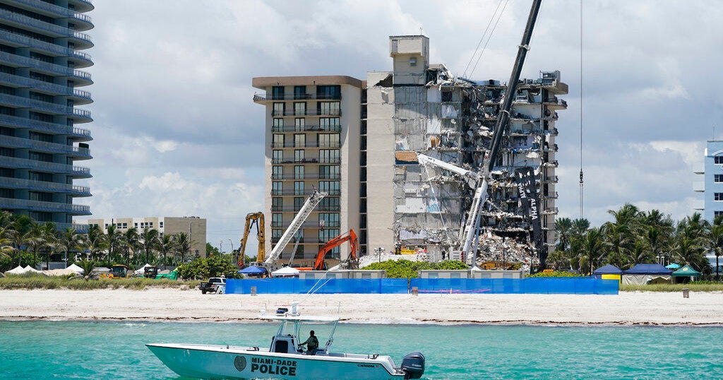 Confirmed death toll in Surfside condo collapse rises to 28 - CBS News