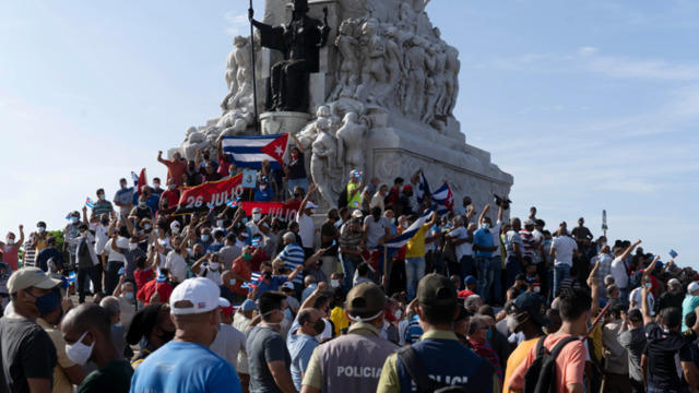 cbsn-fusion-thousands-took-to-cubas-streets-on-sunday-to-protest-food-shortages-and-rising-prices-amid-the-pandemic-thumbnail-751840-640x360.jpg 