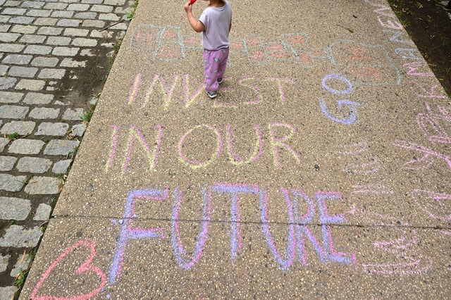Parents Celebrate New Monthly Child Tax Credit Payments Outside Senator Schumer's Home, Urge Congress To Make Them Permanent