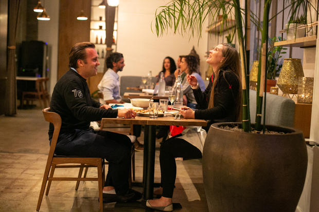 Restaurant goers enjoy dinner at Cassia as the much loved restaurant re-opens its indoor dining and continues outdoor dining. 