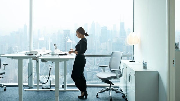 woman at standing desk