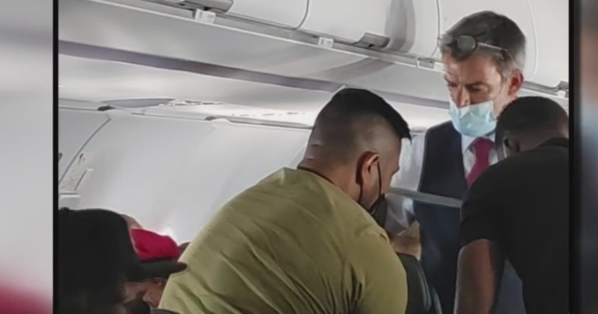 Caught On Camera Teenage Passenger Restrained On Flight From Maui To