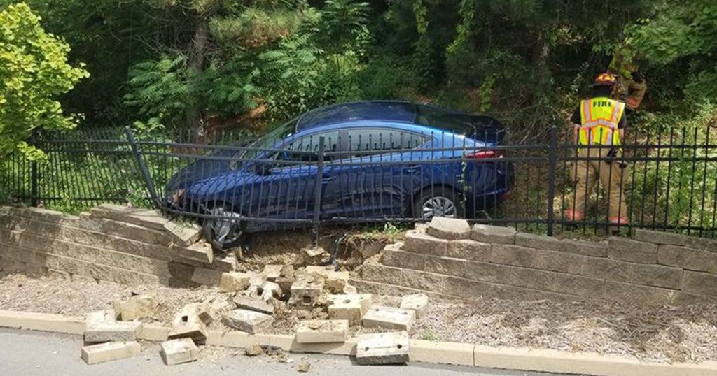 Car Crashes Over Hillside And Through Fence, Into Wall In Brentwood ...