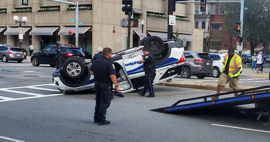 2 Boston Police Officers Injured After Cruiser Flips Over In Back Bay ...