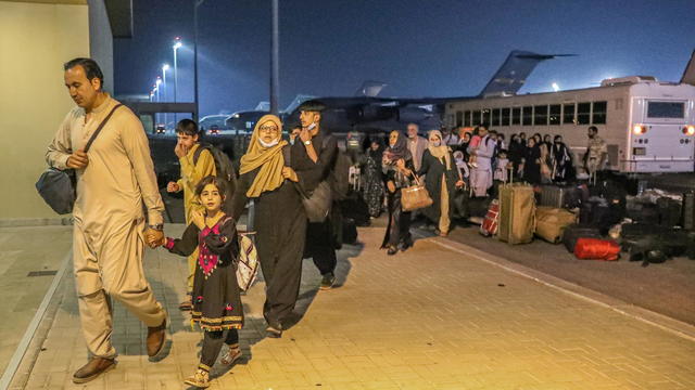 Evacuees from Afghanistan arrive at Al-Udeid airbase in Doha 