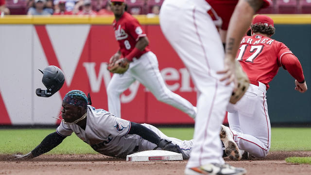 Naquin Homers Twice, Helps Cincinnati Reds Beat Miami Marlins to