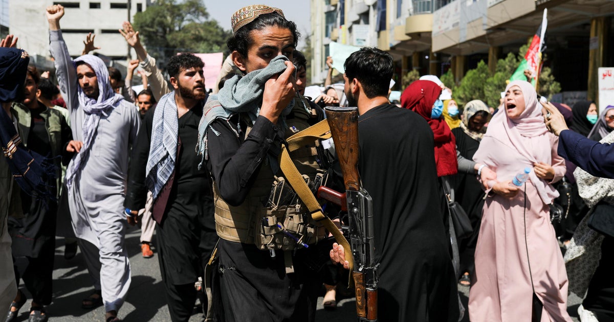 Taliban faces defiant protests as U.S. works with group to secure ...