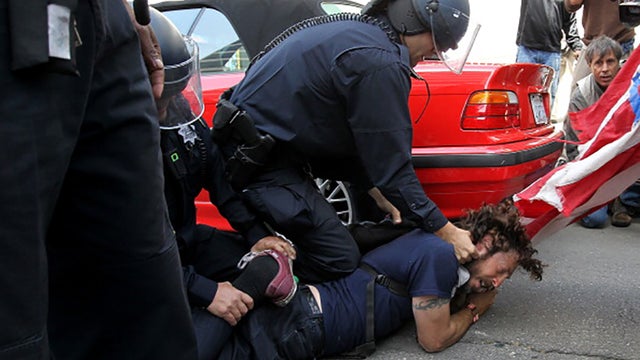 protestor-choke.jpeg 