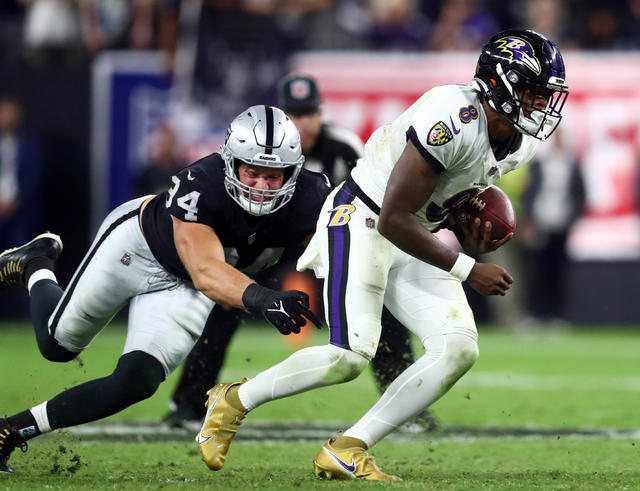 Raiders defensive end Carl Nassib (94) celebrates after beating the  Baltimore Ravens in overtim …