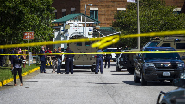 Police respond to the scene of a shooting at Heritage High School in Newport News, Virginia, on September 20, 2021. 