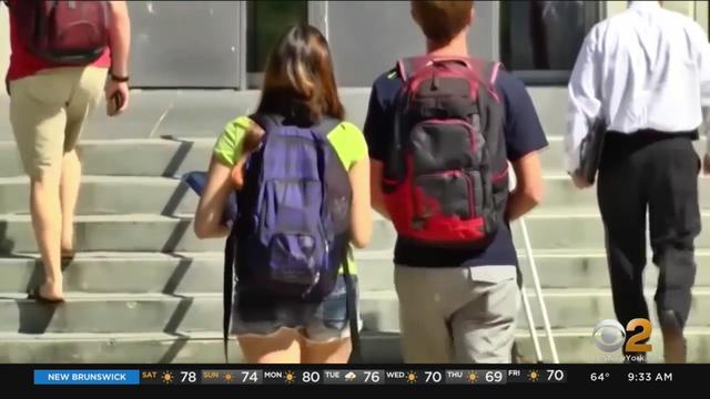 students-walking-backpacks.jpg 